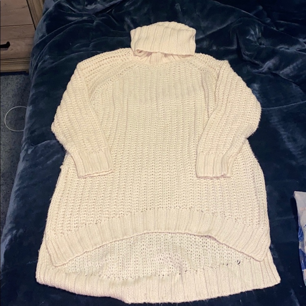 High-low cream Charming Charlie turtleneck sweater